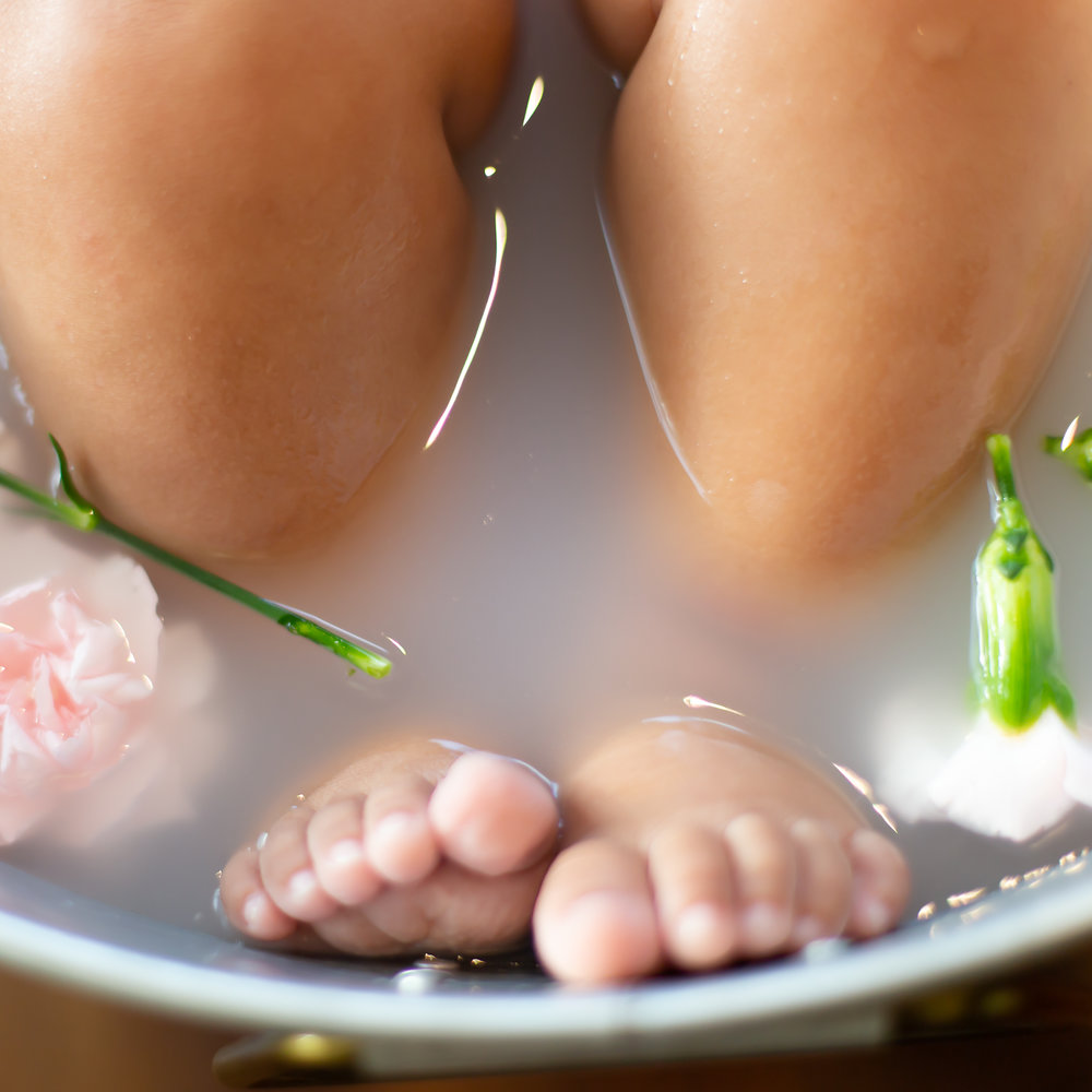 milk bath baby feet